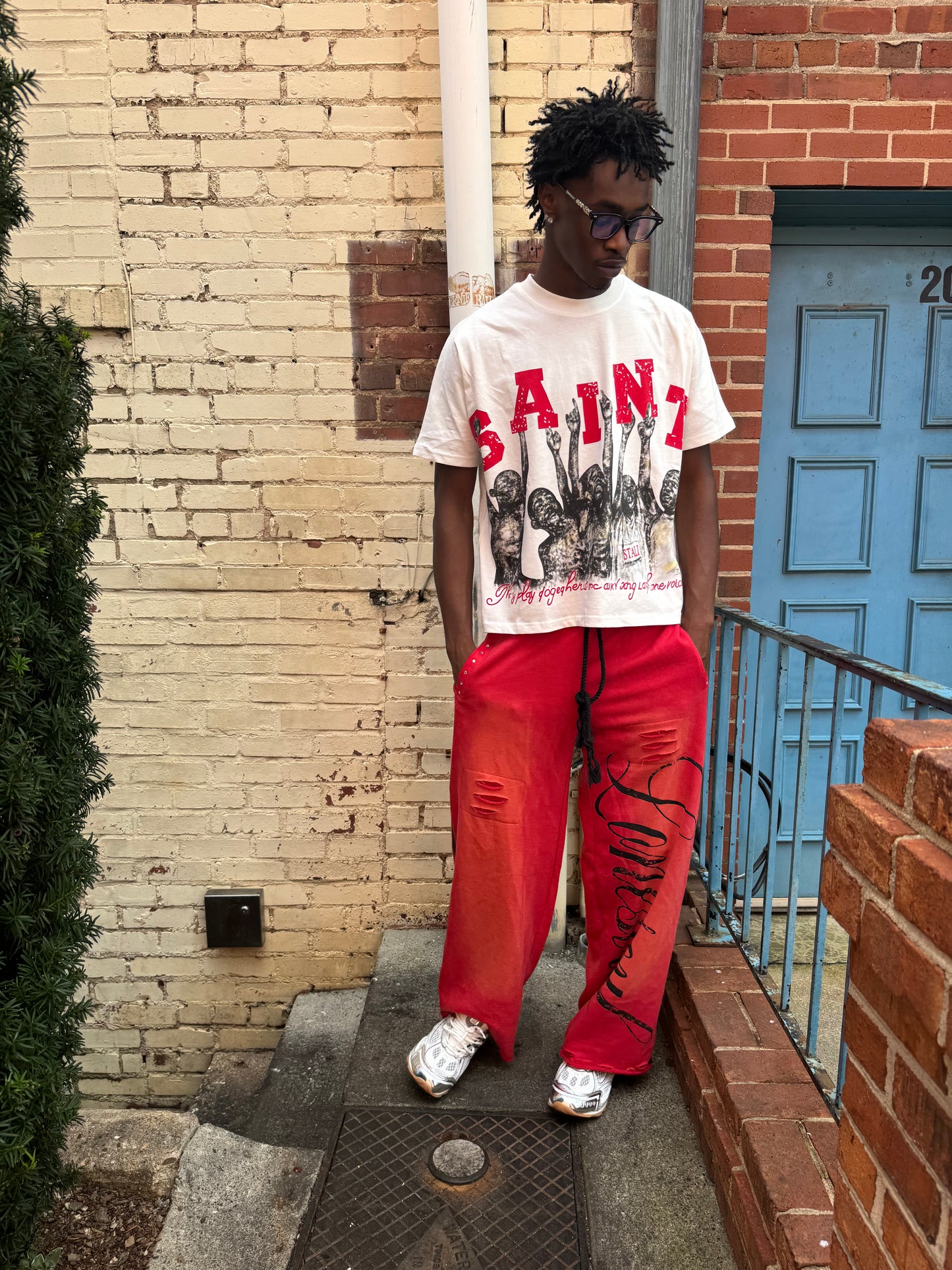 Red “rupture” sweatpants